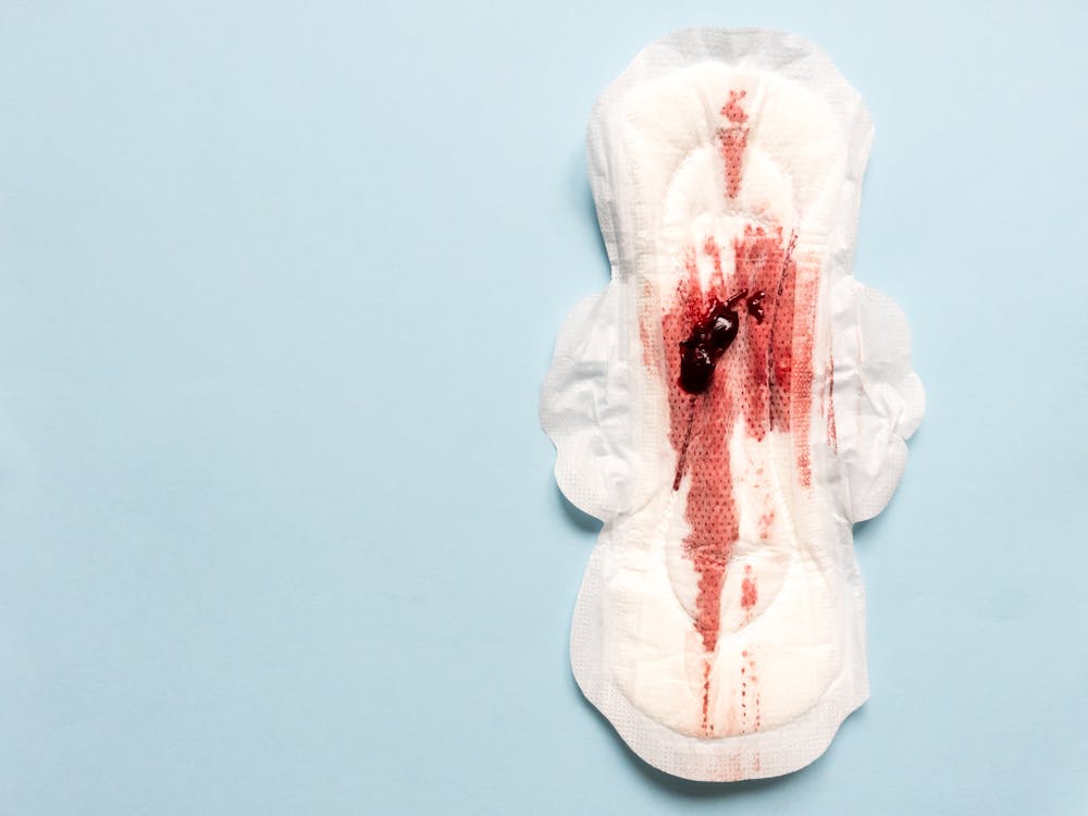 Heavy Period Bleeding: Signs, Causes & Relief