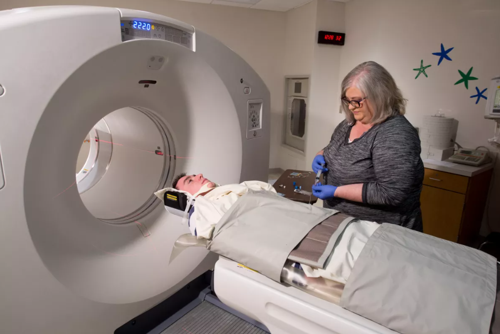 Is it safe to be around someone after a PET scan?